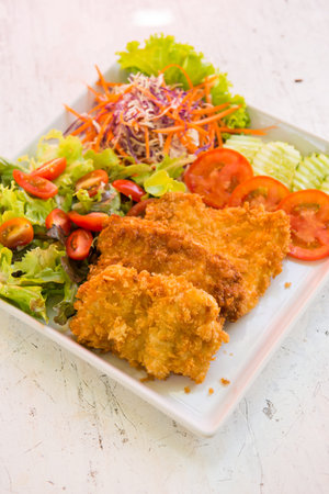 fried chicken with saladの写真素材