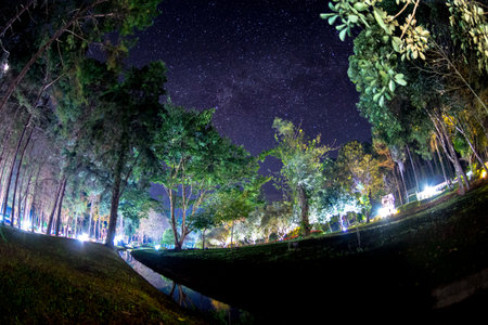 The beautiful night sky with light of moon and milkyway at Pang Ung Lake in Mae Hong Son's city, North of THAILAND.の写真素材