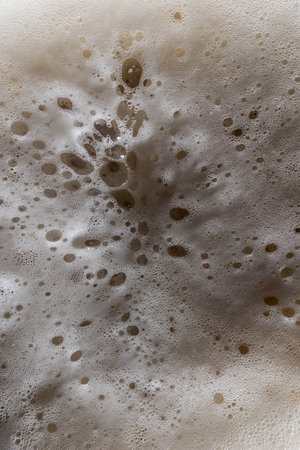 Creamy beer foam and bubbles textureの写真素材