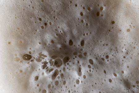 Creamy beer foam and bubbles texture