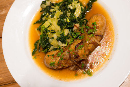 Grilled sausage with Cheesy Creamed Spinachの写真素材