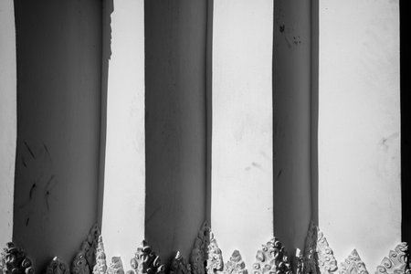 Abstract light and shadow of cement texture with THAI artの写真素材