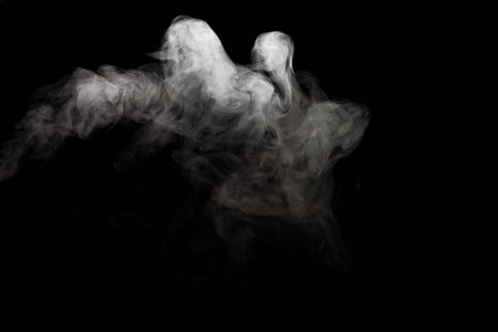 White smoke isolated on black background.