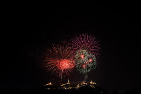 Beautiful fireworks with Phra Nakhon Khiri ancient place (Khao Wang) landmark of Phetchaburi Province Thailandの写真素材