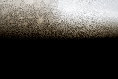 Dark lager Craft Beer bubbles background texture