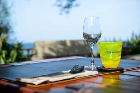 Wine glasses on table in restaurantの写真素材
