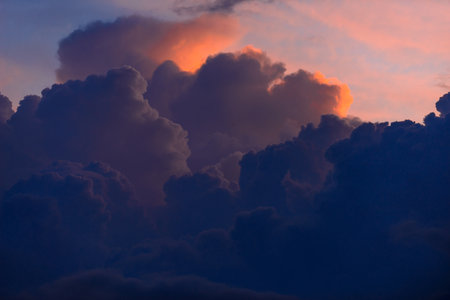 beautiful twilight sky with red, orange and blue colorsの写真素材