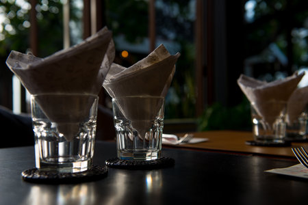 Glasses and Table Setting in Restaurantの写真素材