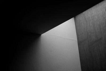 abstract light and shadow on cement wall textureの写真素材