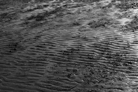 sand texture on beach light and shadowの写真素材