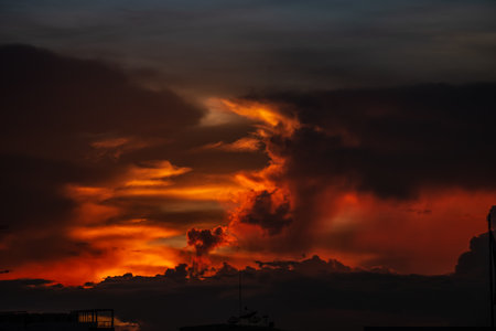 Clouds with sunset sky background wallpaper; colorful twilight sunsetの写真素材