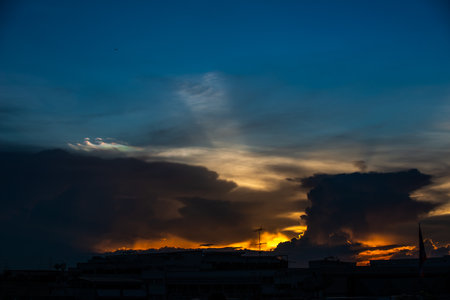 Clouds with sunset sky background wallpaper; colorful twilight sunsetの写真素材