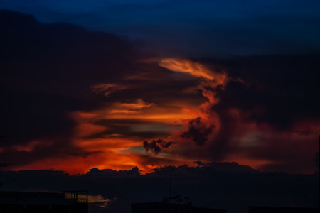 Clouds with sunset sky background wallpaper; colorful twilight sunsetの写真素材