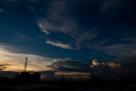 Clouds with sunset sky background wallpaper; colorful twilight sunsetの写真素材