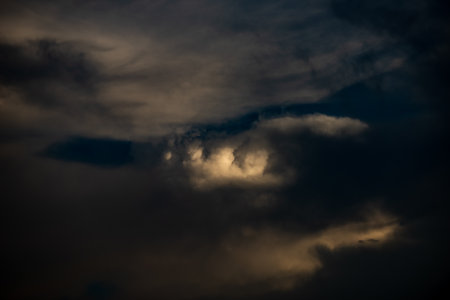 Clouds with sunset sky background wallpaper; colorful twilight sunsetの写真素材