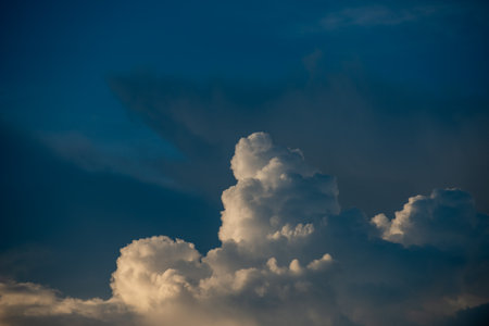 Clouds with sunset sky background wallpaper; colorful twilight sunsetの写真素材