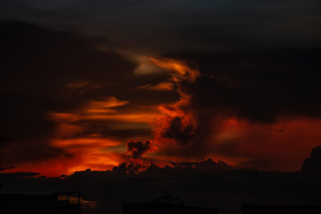 Clouds with sunset sky background wallpaper; colorful twilight sunsetの写真素材