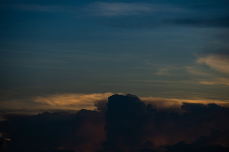 Clouds with sunset sky background wallpaper; colorful twilight sunsetの写真素材