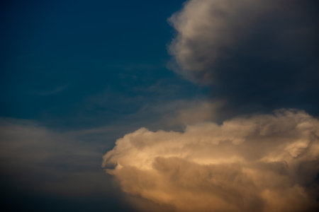Clouds with sunset sky background wallpaper; colorful twilight sunsetの写真素材