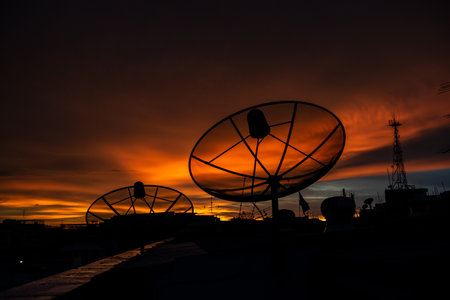 Beautiful golden sunset sky with cloudsの写真素材