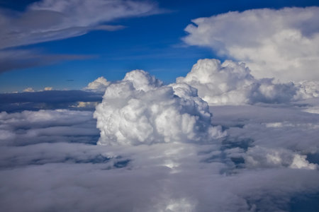 Beautiful sky and clouds from window of planeの写真素材