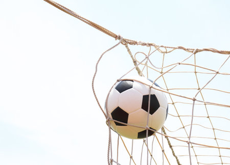 soccer ball in goal の写真素材