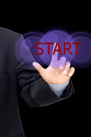 Business person pushing symbols on a touch screen