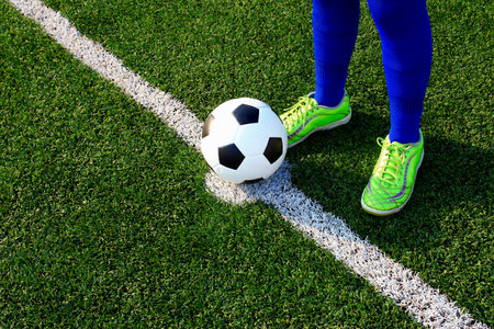 Legs of the soccer player 