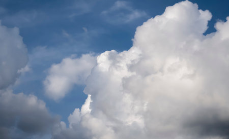 blue sky with large beautiful air clouds floating in weightlessness. High quality photoの写真素材
