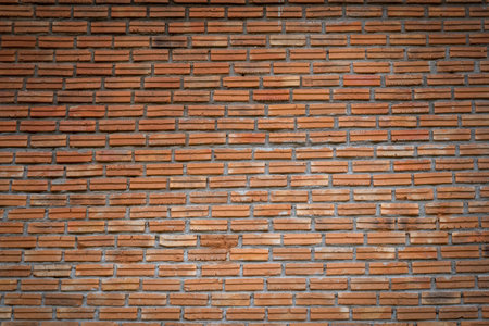 facade view of old brick wall backgroundの写真素材
