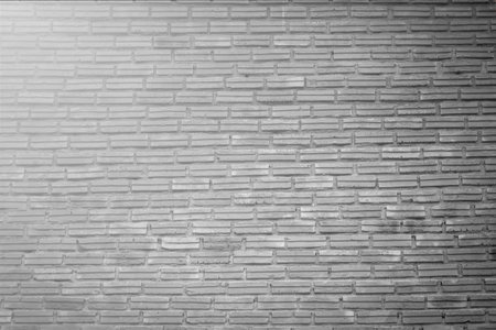White grunge brick wall texture backgroundの写真素材