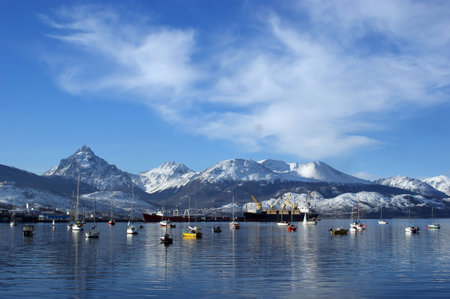 Cargo ships,fishing boats and private yatchs in the harbourの写真素材