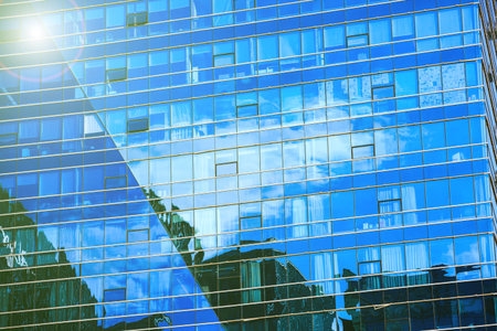 The glass curtain wall of a modern skyscraperのeditorial素材