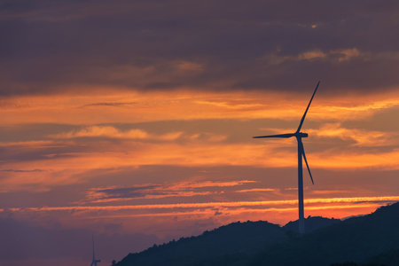 Wind turbines in the sunsetの写真素材