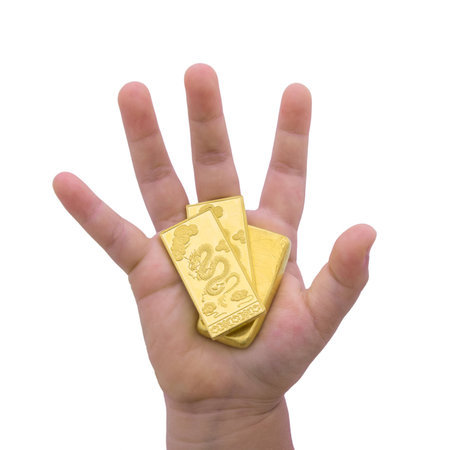 Gold dragon in my handの写真素材