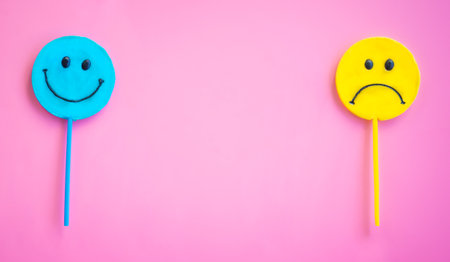 candy emotion face in pink backgroundの写真素材