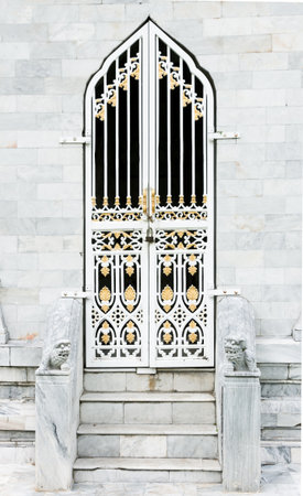 antique church door and marble strairs