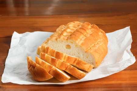 bread sliced on wood table