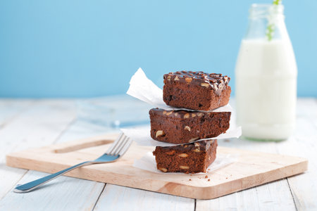 Chocolate brownie cake with milkの写真素材