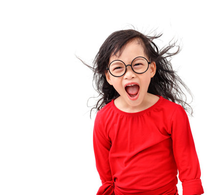 Asian little girl  shouted loudly isolated on white backgroundの写真素材