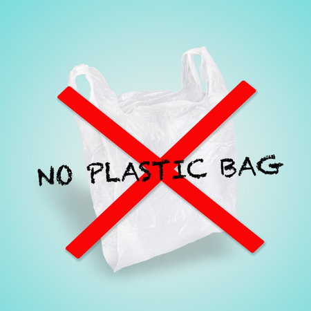 Plastic bag in cross sign. Isolated blue background.