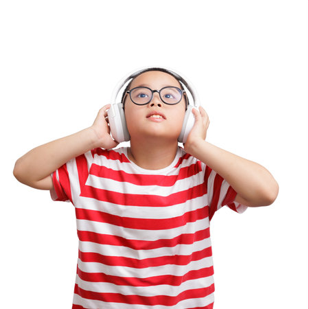 boy wearing headphones and looked up above. isolated on white background.の写真素材