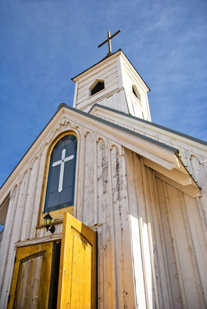 Looking up at a chapel steepleの写真素材