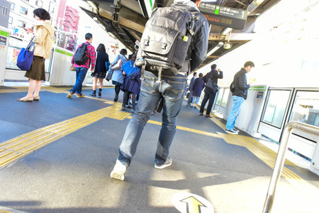 Tokyo,Japan November 21 2018 Unidentified People in train stations in Tokyo. Blur Travel of Japanese people in travel in Tokyo.のeditorial素材