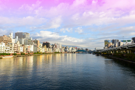 Tokyo, Japan November 25 2018 The sun shines on the bridge sumida river in Tokyo. shines on the streets of Tokyoのeditorial素材