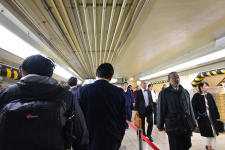 Tokyo,Japan November 21 2018 Unidentified People in train stations in Tokyo. Blur Travel of Japanese people in travel in Tokyo.のeditorial素材