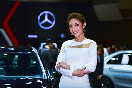 Bangkok Thailand August 24 2019 blur Unidentified Pretty is presenting a car for sale at the Bangkok Motor Showのeditorial素材