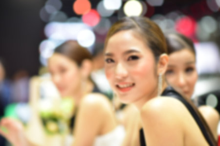 Bangkok Thailand August 24 2019 blur Unidentified Pretty is presenting a car for sale at the Bangkok Motor Showのeditorial素材