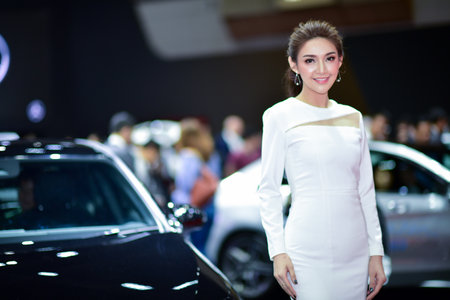 Bangkok Thailand August 24 2019 blur Unidentified Pretty is presenting a car for sale at the Bangkok Motor Showのeditorial素材