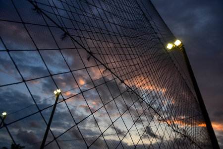 Black sky with football field net backgroundの写真素材